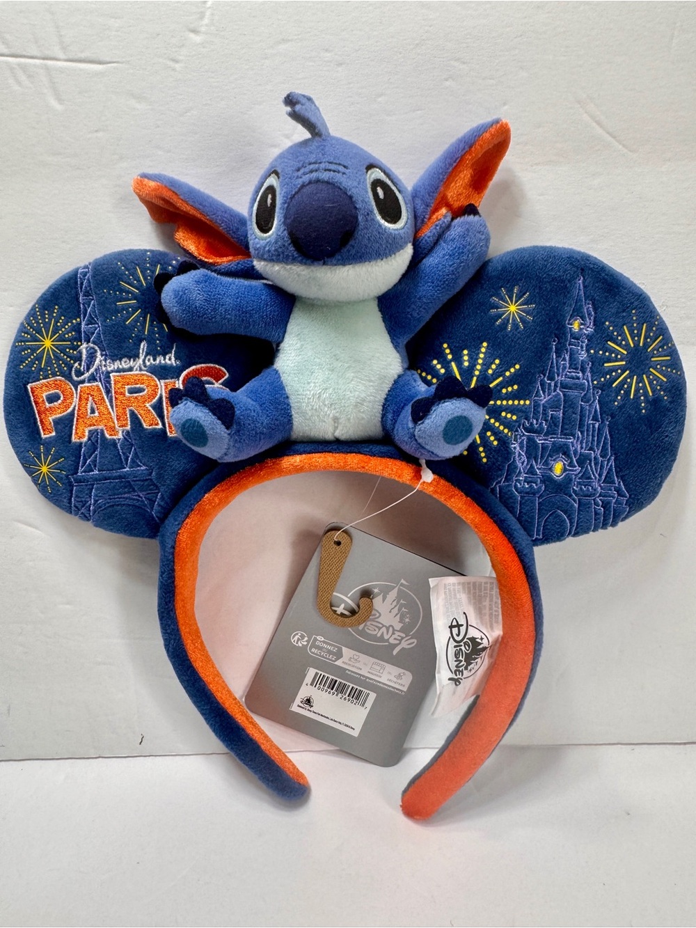 NWT Disneyland Paris Stitch Ears Headband, featuring a small Stitch plush